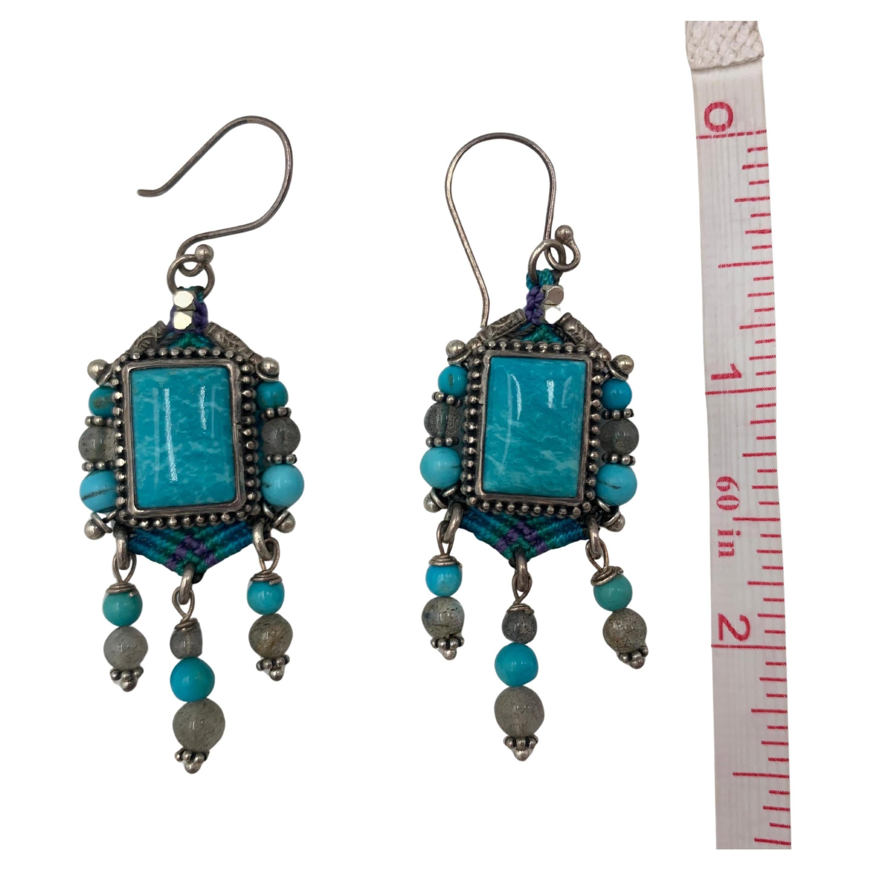 Sterling silver with beautiful French knot-work highlighting a rectangular turquoise stone which is 3/8
