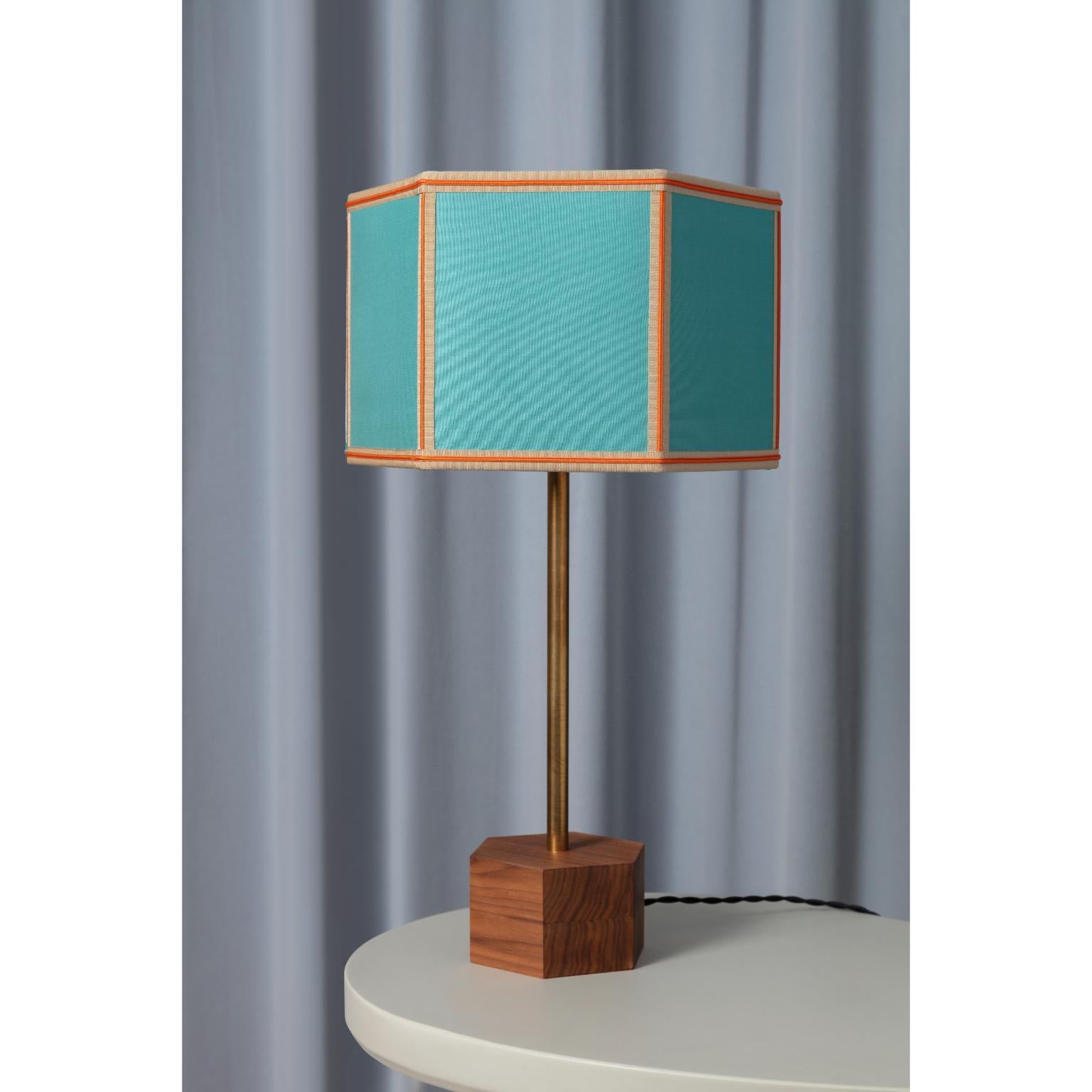 Turquoise Easy Table Lamp by Servomuto
Dimensions: W 26 x D 30 x H 58 cm
Materials: Lampshade: Cotton with contrasting trimmings. Base: Hexagonal Canaletto walnut wood, burnished brass stem.
Weight: 1,35 Kg. 

The Easy Table Lamp focuses on
