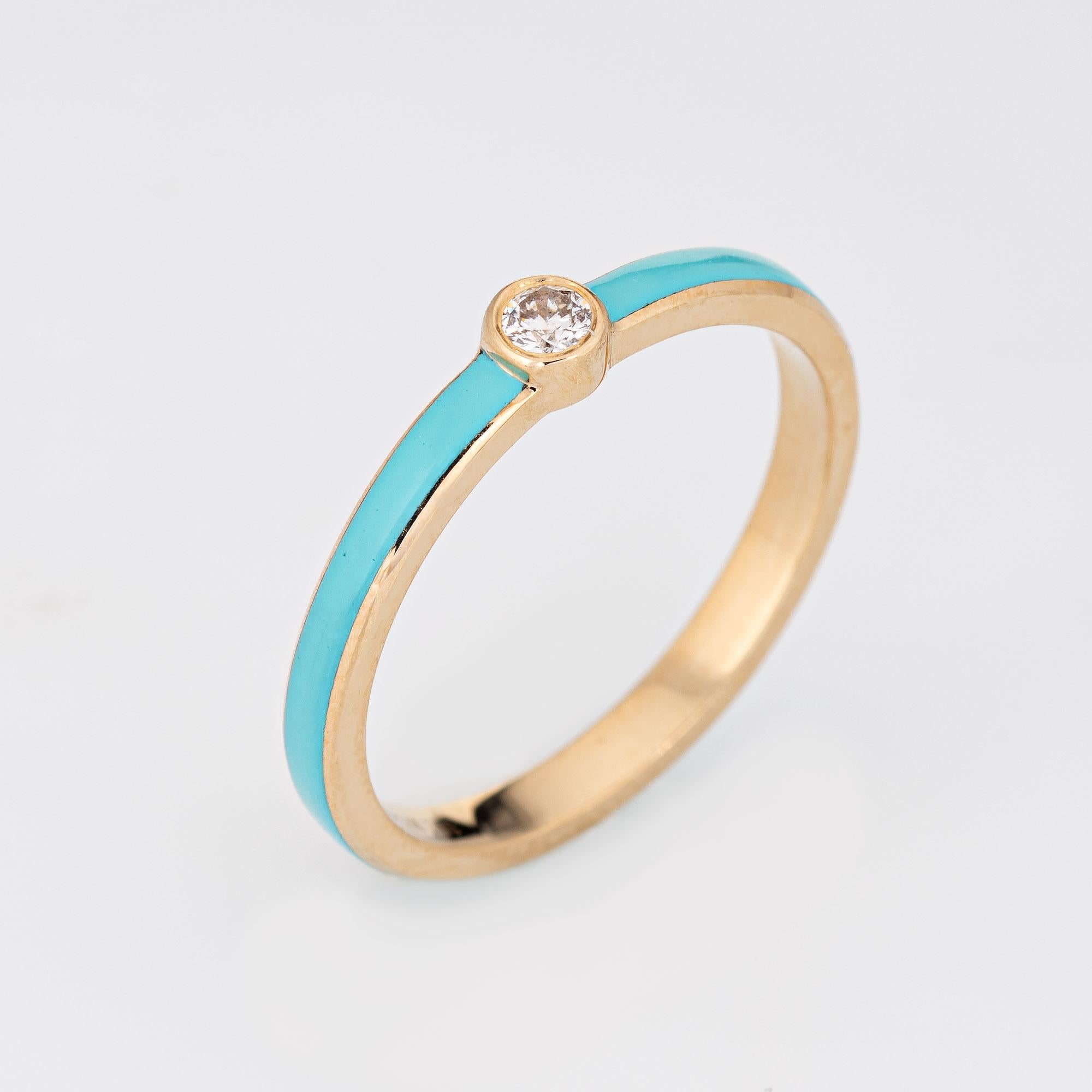 Stylish turquoise & diamond stacking band crafted in 14 karat yellow gold. 

1 round brilliant cut diamonds total an estimated 0.03 carats (estimated at H-I color and SI2 clarity). 

The enameled band is a striking turquoise color with a small
