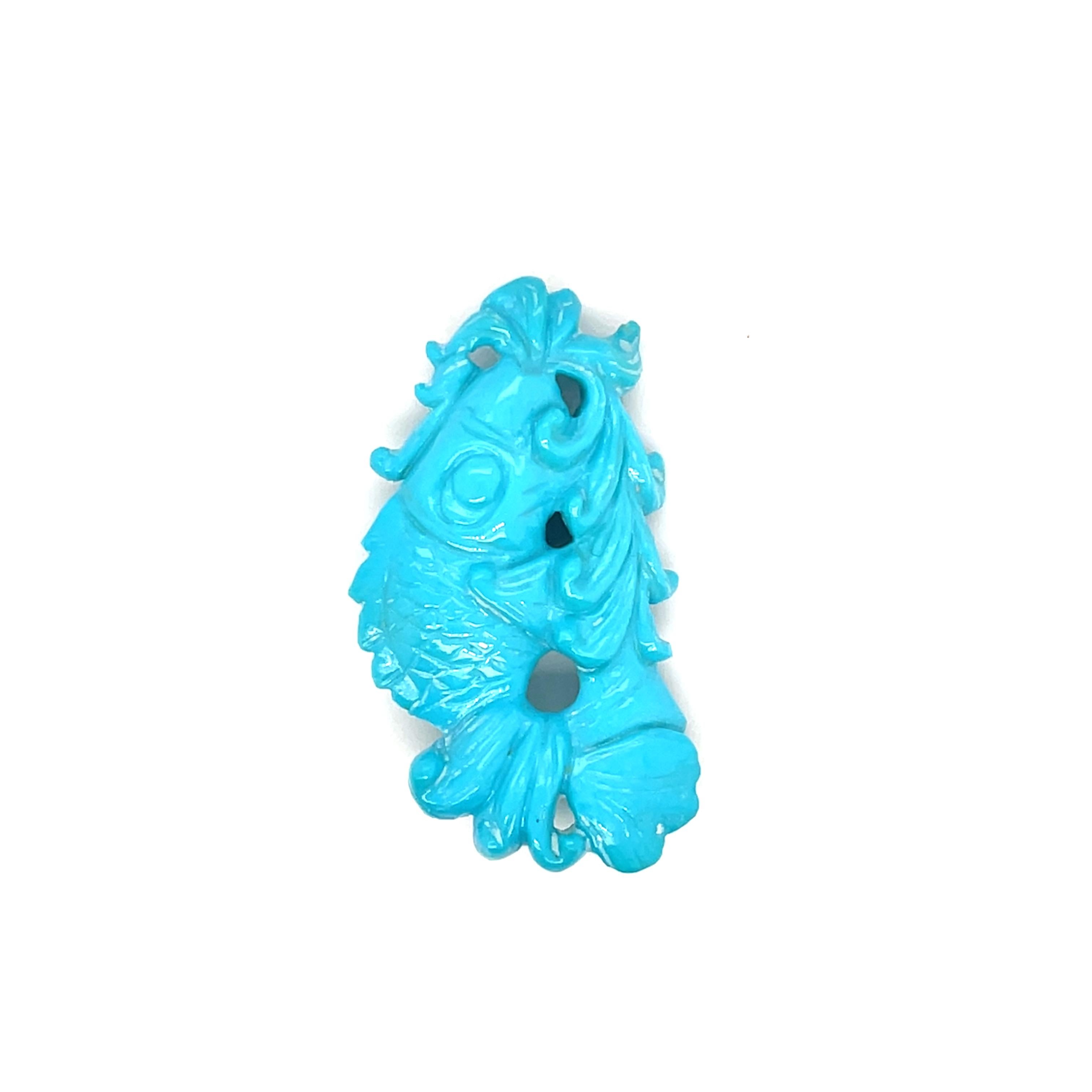 Questo splendido ciondolo a forma di pesce turchese presenta le affascinanti sfumature blu-verdi del turchese, proveniente dalle rinomate miniere della Persia (l'odierno Iran).

La gemma non è solo un simbolo di tranquillità, protezione e guarigione