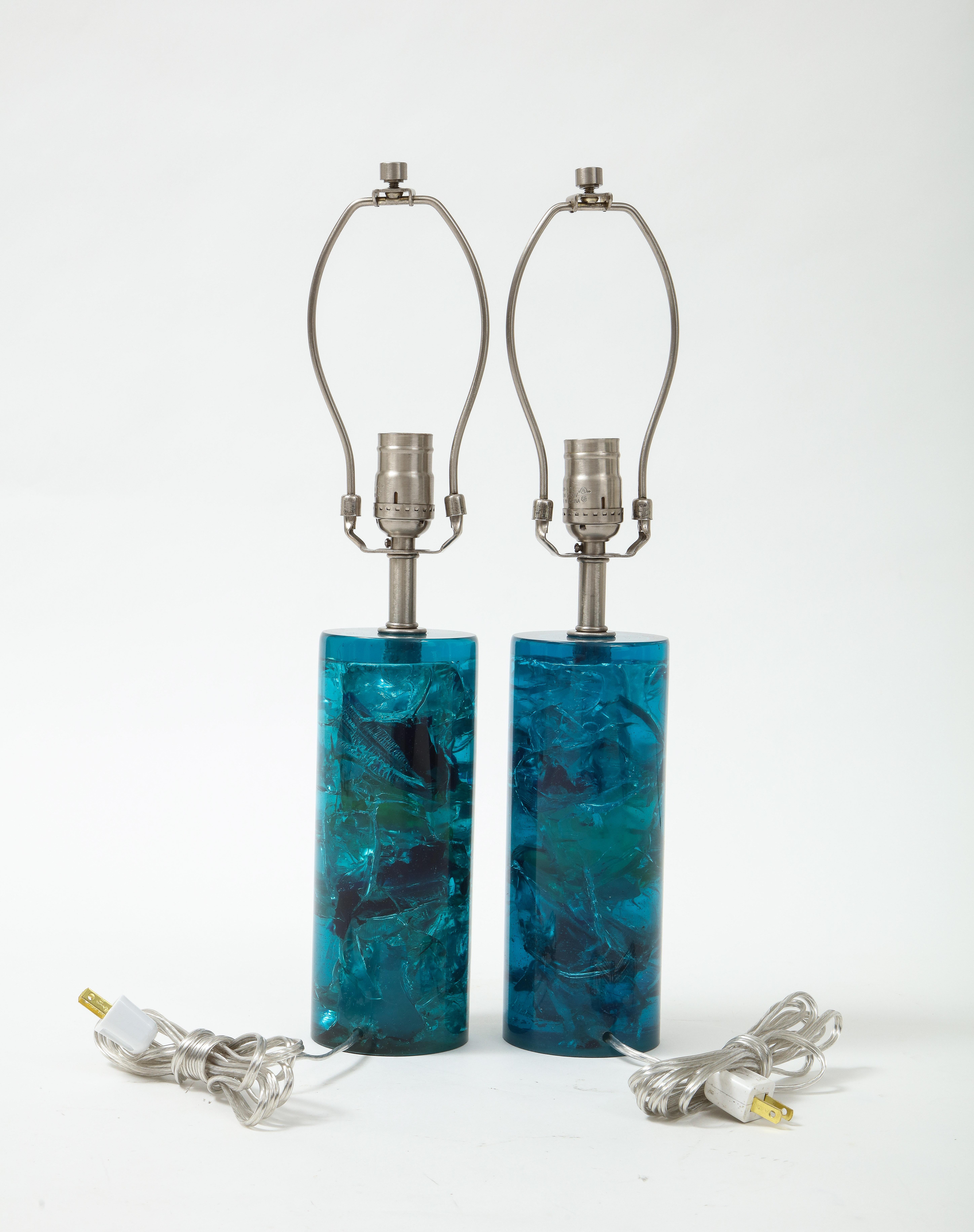Pair of French mid century fractal resin cylinder lamps in an eye catching Turquoise blue. Rewired for use in the USA. 100W max. Height listed is an overall height including harp.