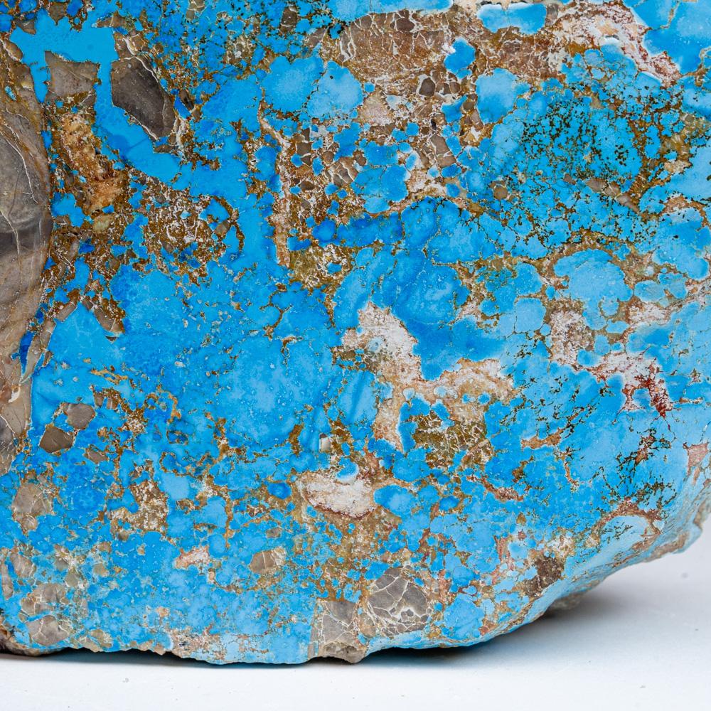 From Sleeping Beauty Mine, Miami District, Gila County, Arizona

Flat specimen of pure sleeping beauty turquoise with bright blue color. Sleeping Beauty turquoise is one of the most recognizable types of turquoise in the world and has practically