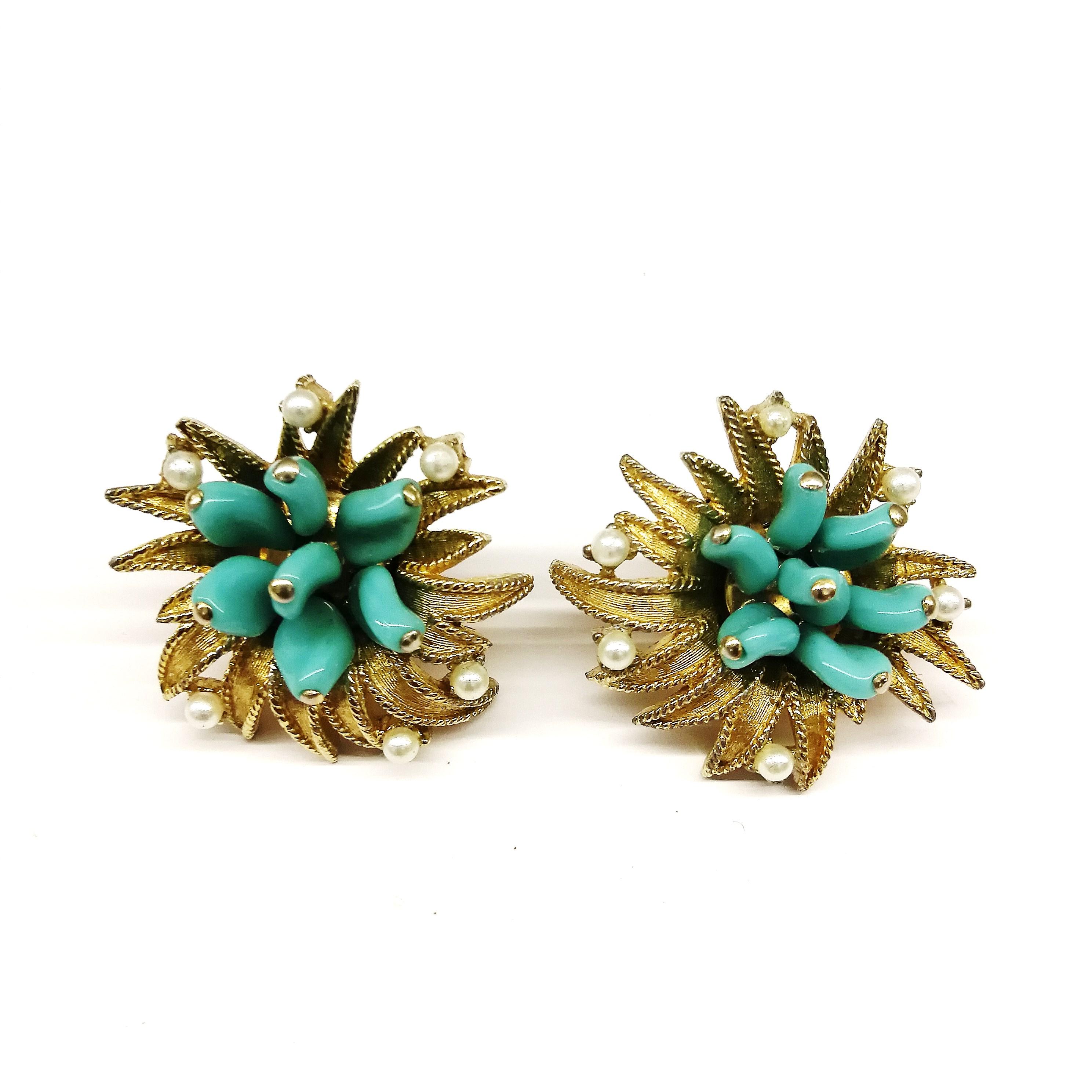 Bright 'sunburst' style earrings with turquoise glass 'petals' and paste pearls, from Marcel Boucher, displaying the high quality always found with this designer. Not highly dressy, but bright and glamorous, making these earrings very