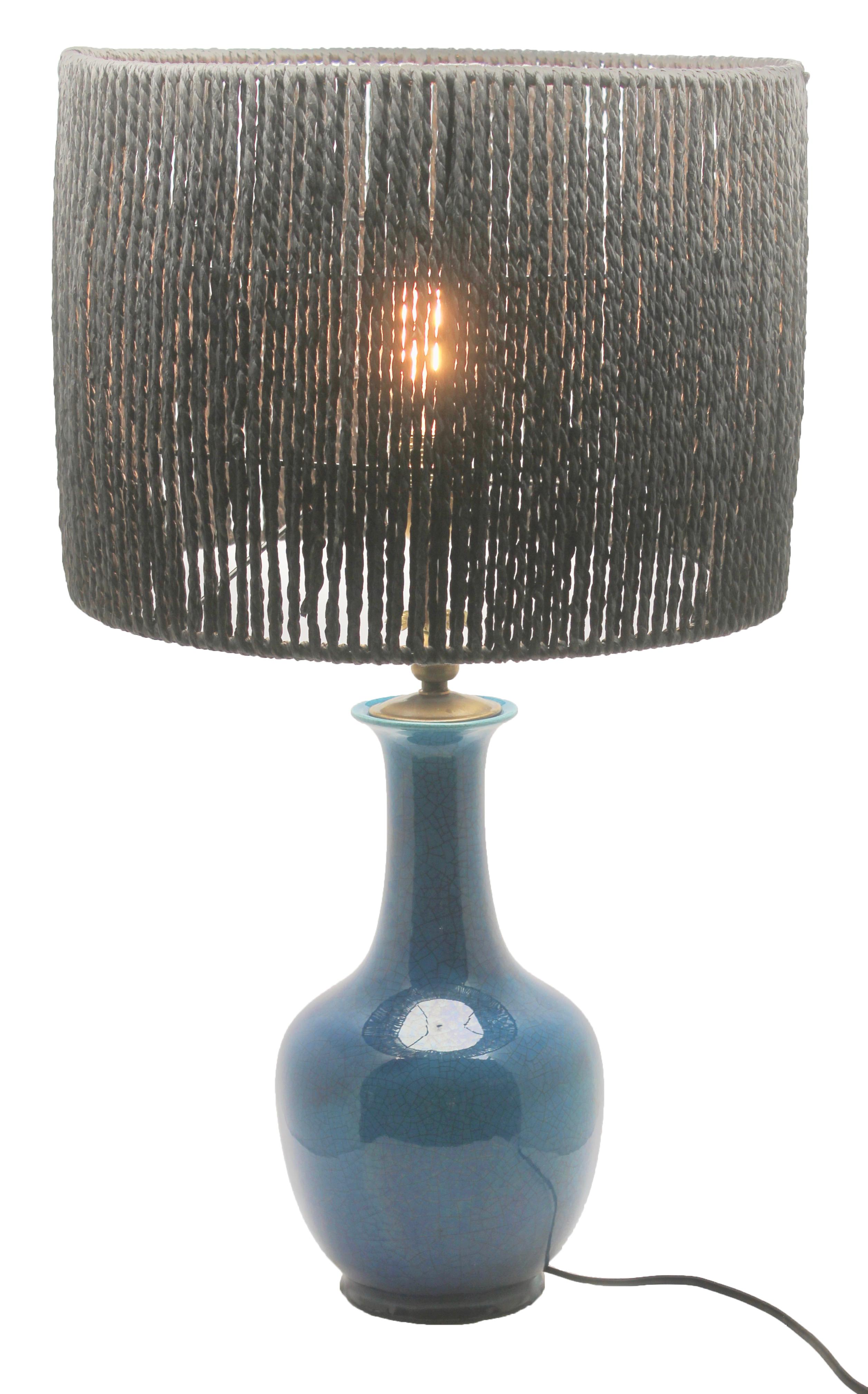 Inspired by a centuries old technique of Chinese ceramics, this elegant table lamp is a bright and dramatic shade of turquoise with a fine crackle glaze.
Renewed and rewired with pedestal lamp fitting (E27)
Important: The lampshade is included in