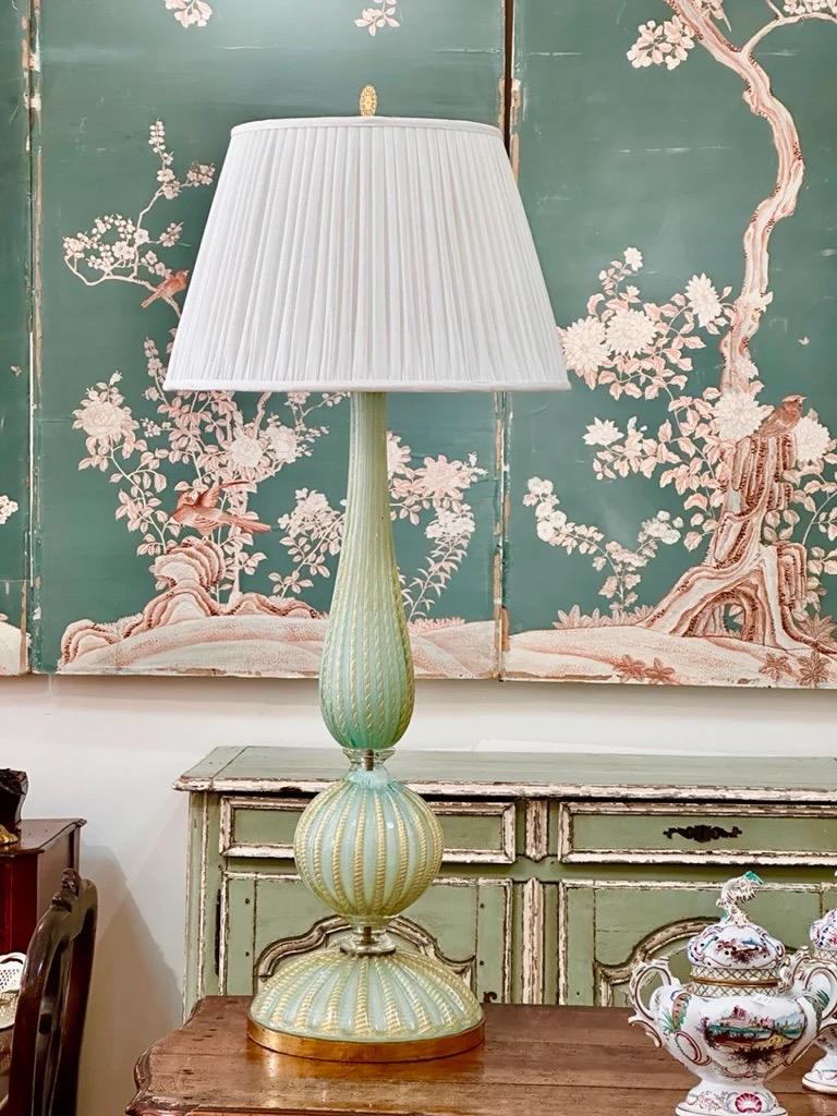 A spectacular turquoise and gold aventurine Murano glass table lamp circa 1960. Ht: 37.5