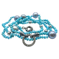 Collana con perline di turchese, ematite grigia, perla grigia e zaffiro bianco in argento