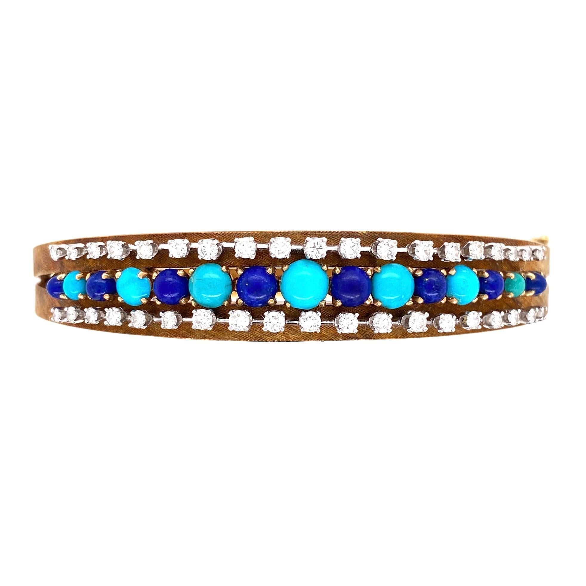 Jeweled 14K Gold Hinged Bangle Bracelet set with Turquoise, Lapis Lazuli and Diamond. Approx. 1.00 total Diamond Carat weight. Hand set and Hand crafted in 14 Karat yellow Gold. Classic and Timeless...A perfect compliment to your wardrobe! 
