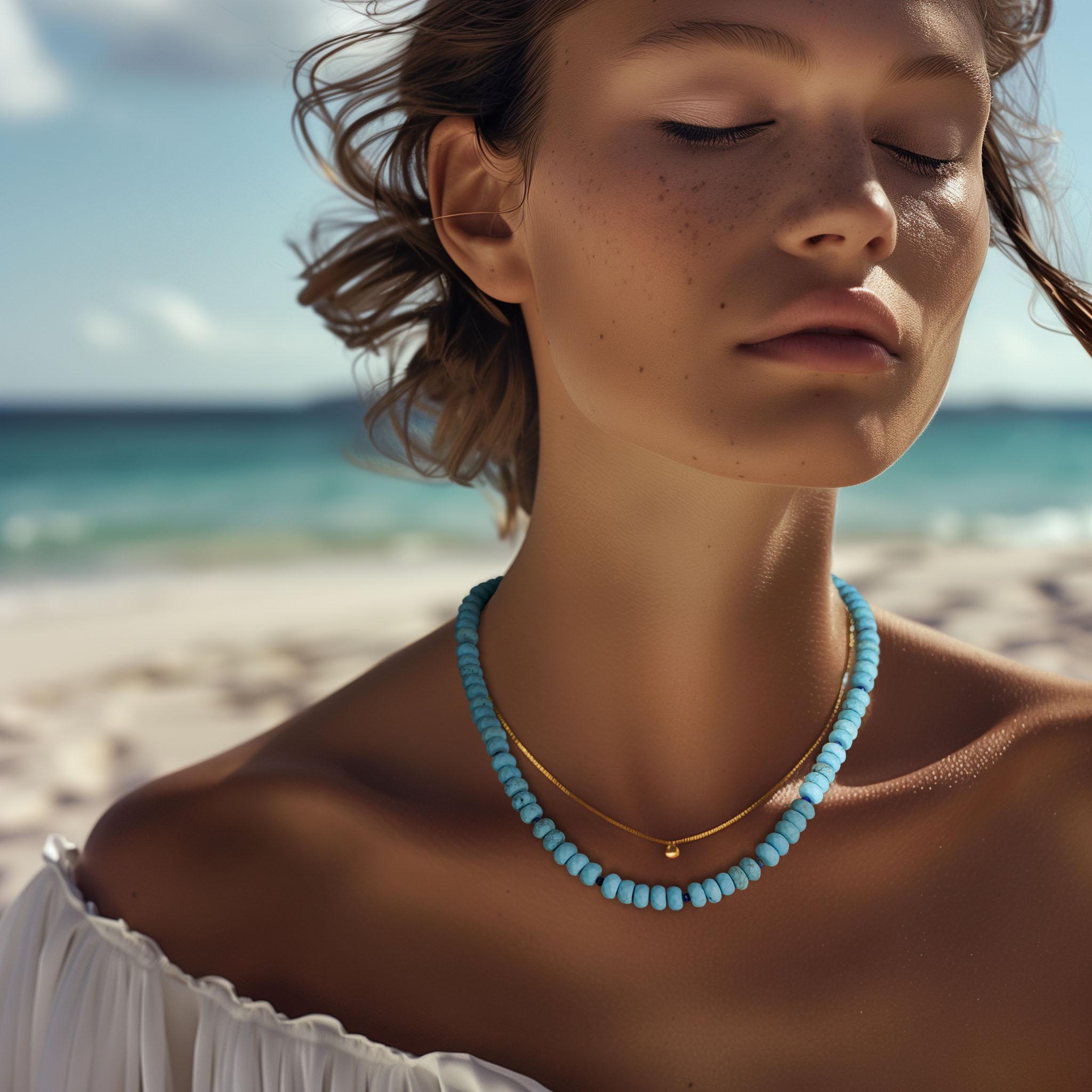 Celebra la tua eleganza con la Collana di Lapis Turchese, un'audace combinazione di perle di turchese liscio e accenti di lapis blu profondo. Questo pezzo sorprendente irradia energia e raffinatezza senza tempo, rendendolo una dichiarazione perfetta