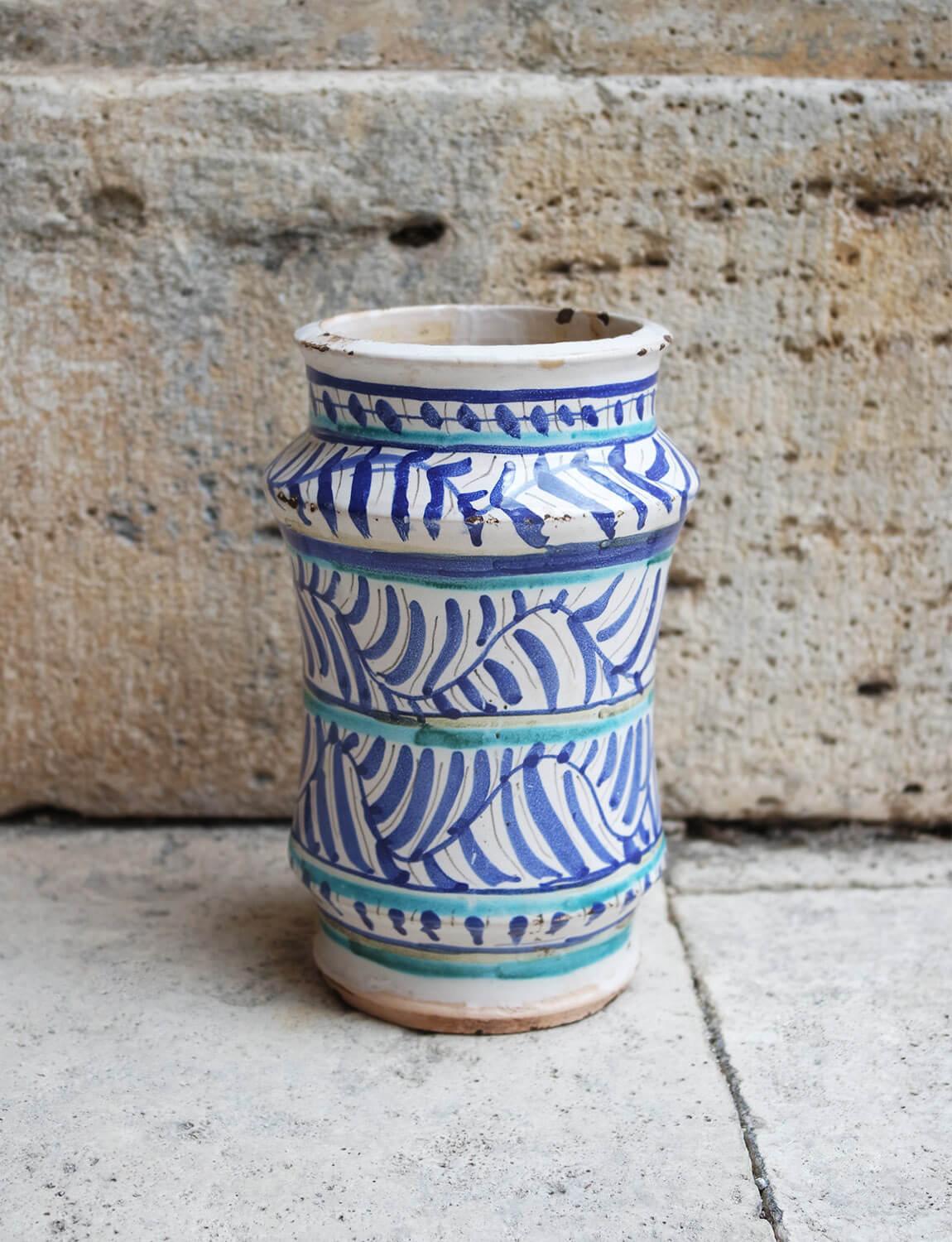 This beautiful turquoise maiolica patterned Italian albarello (late 1800s early 1900s) was found in Palazzo Torlogna in Rome. Albarelli were ancient storage containers often used in old pharmacies and shops. Their unique shape was designed to fit