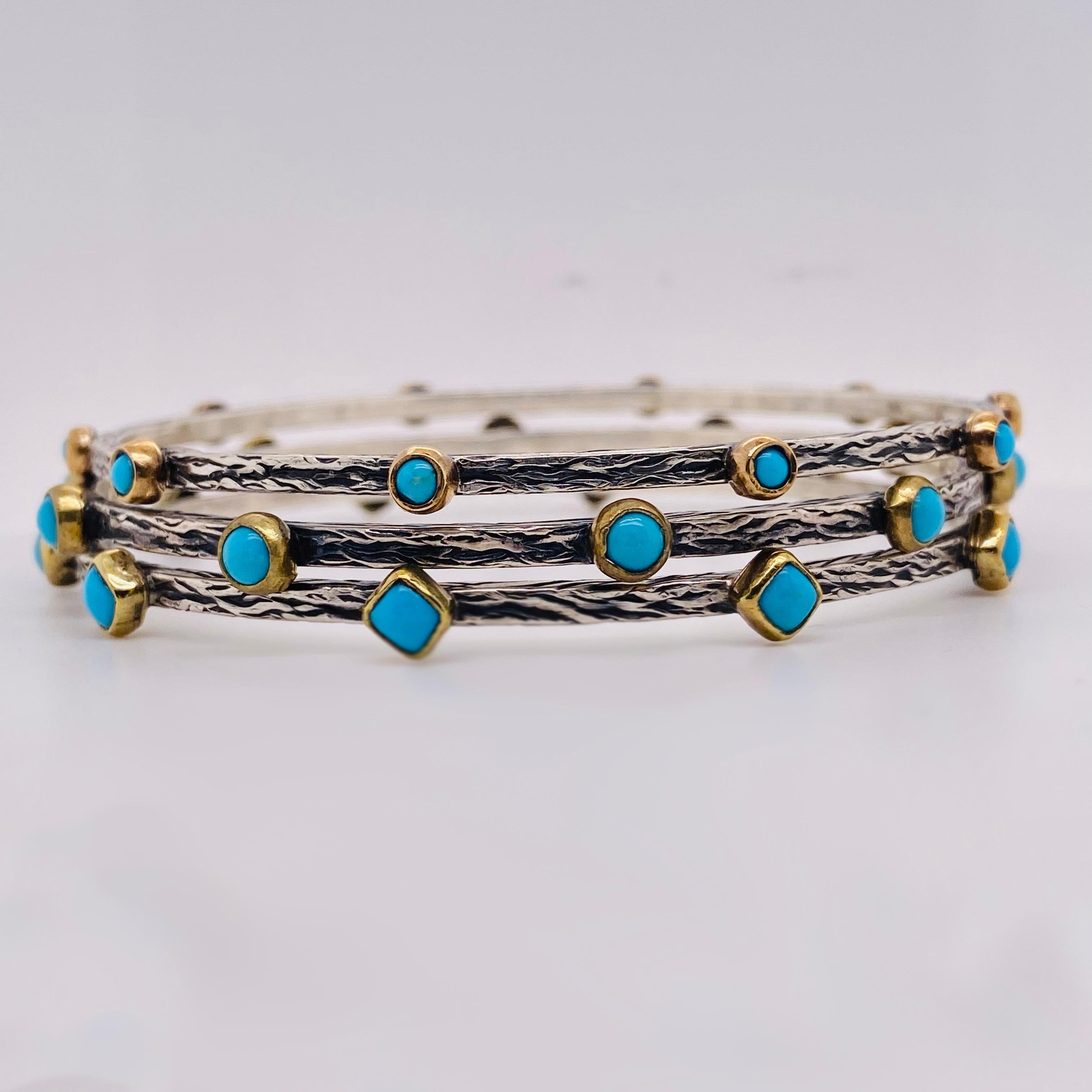 This is an amazing single bangle with turquoise!  The bracelet is oxidized sterling silver with gold bezel around each stone.  This item is for only one of the bracelets but we do have up to 3 for purchase! If you want all three we can make it a