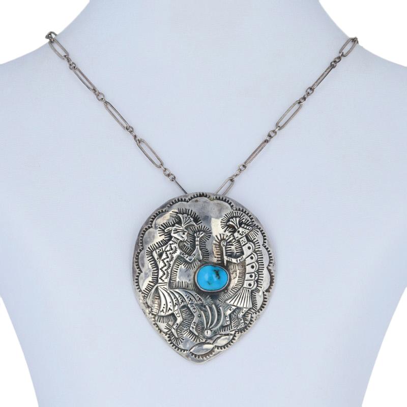 Native American
Metal Content: Guaranteed Sterling Silver as tested

Stone Information: 
Genuine Turquoise
Treatment: Routinely Enhanced
  
Pendant: 2 9/16