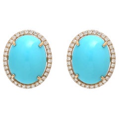 Pendientes de botón con turquesa y diamantes naturales en halo, en oro amarillo de 18 quilates