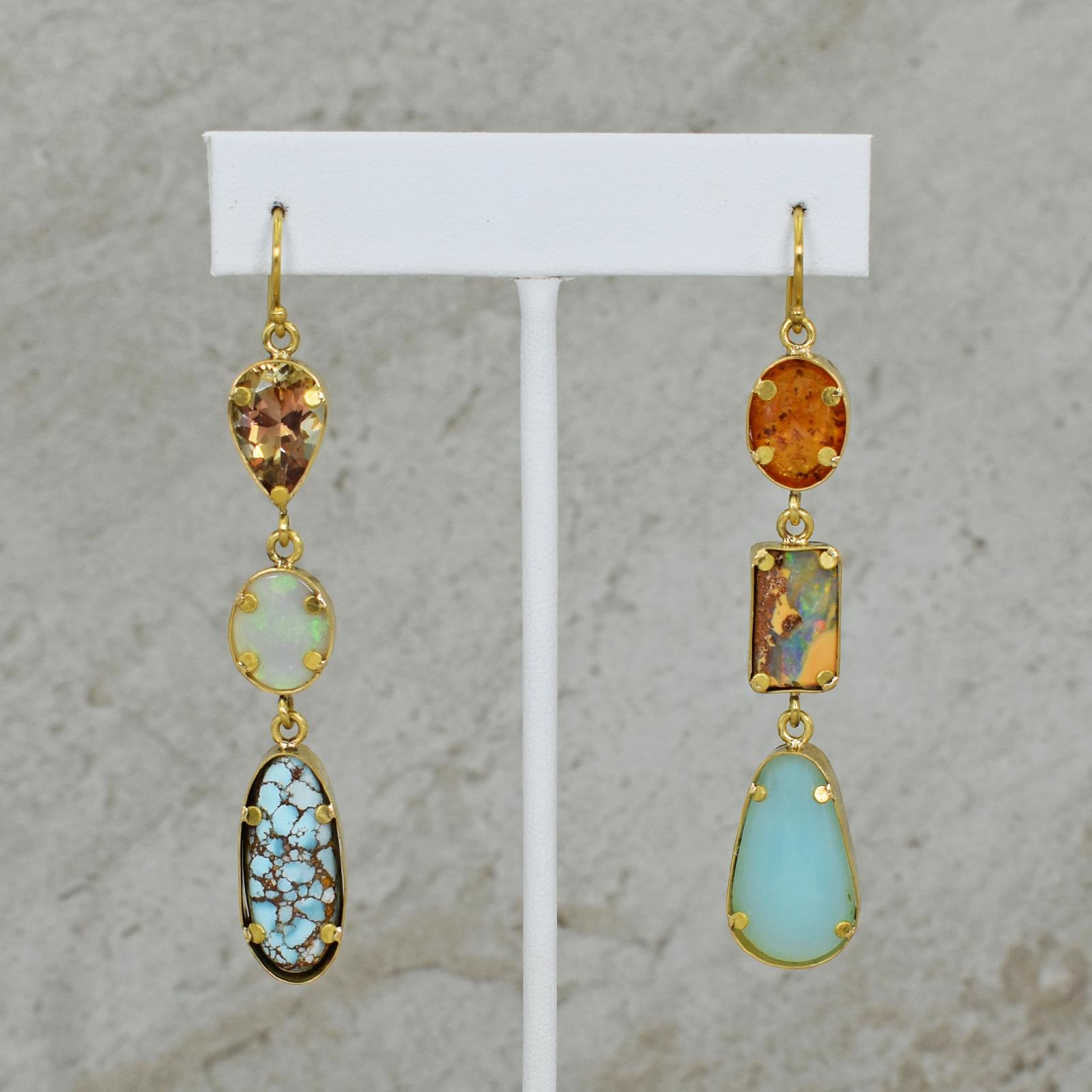 Three tier, hand forged 22k yellow gold dangle earrings featuring Andalusite (3.7 ct), Opal (1.5 ct), Golden Hills Kazakhstan Turquoise (10.2 ct), Amber (7.0 ct), Australian Boulder Opal (5.1 ct), and Peruvian Blue Opal (8.0 ct) gemstones. Dangle