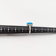 Turquoise Oval Cabochon and White Diamond Ring in Platinum