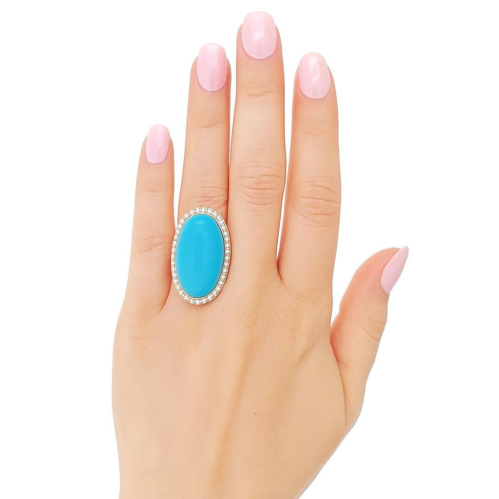 Cette bague de mode en turquoise Elegant est une véritable pièce d'apparat qui attire instantanément l'attention. Dotée d'une pierre ovale turquoise vibrante et lumineuse, sa couleur audacieuse la fait ressortir sans effort dans n'importe quel