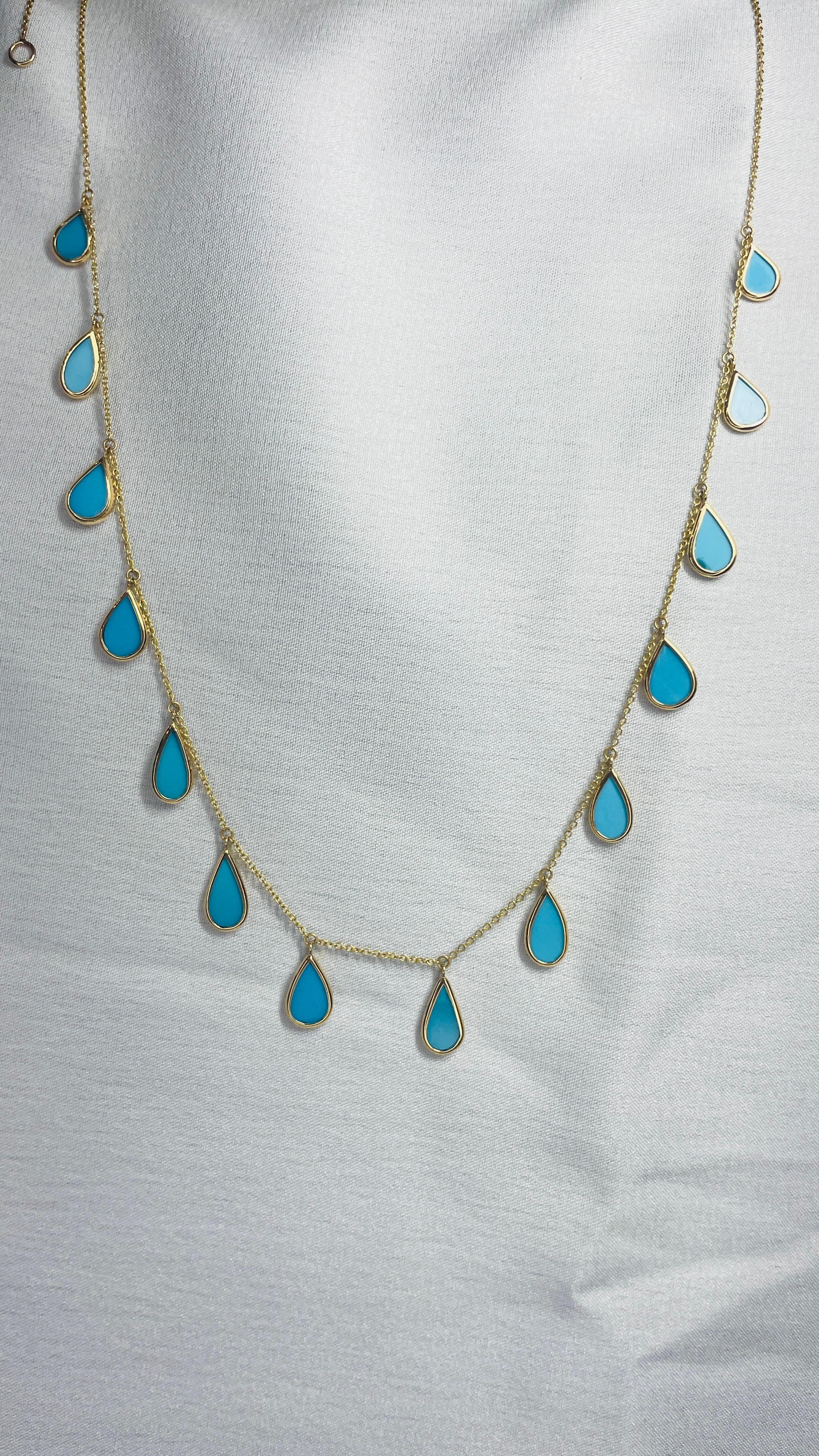 Turquoise Necklace in 18K Gold studded with pear cut diamonds.
Accessorize your look with this elegant turquoise drop necklace. This stunning piece of jewelry instantly elevates a casual look or dressy outfit. Comfortable and easy to wear, it is