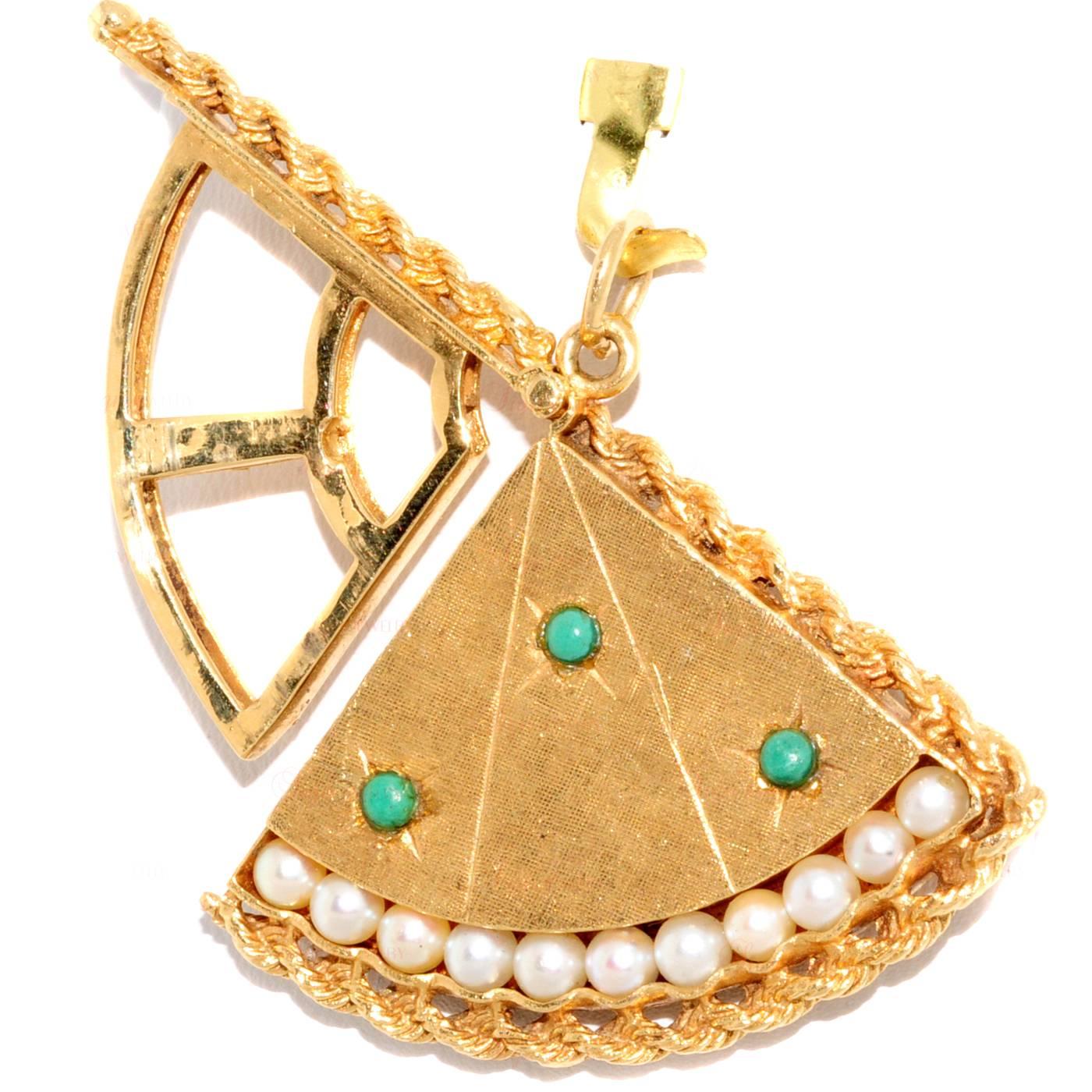 This unique locket in the shape of a fan was made in the 1950s - 1960s. It is crafted out of 18k yellow gold and is accented with 11 pearls and 3 turquoise stones. Measurements: 1.77