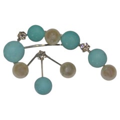 Broche en or blanc 18 carats avec turquoises, perles et diamants