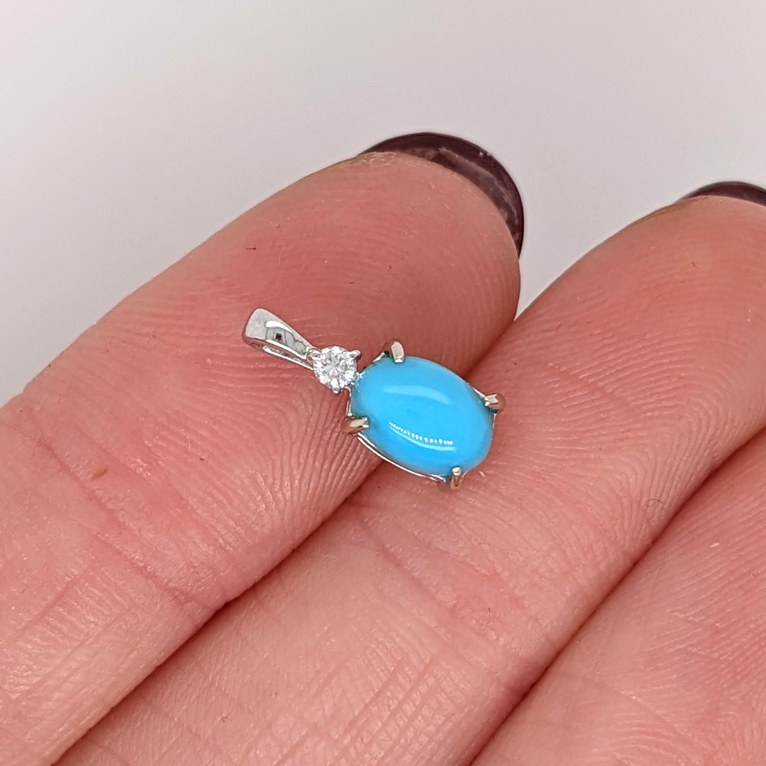 This pendant features a beautiful 7x5mm oval turquoise in solid 14K gold with a natural earth mined diamond accent. This unique piece is perfect for daily wear. This pendant also makes a lovely december birthstone gift for your loved ones!