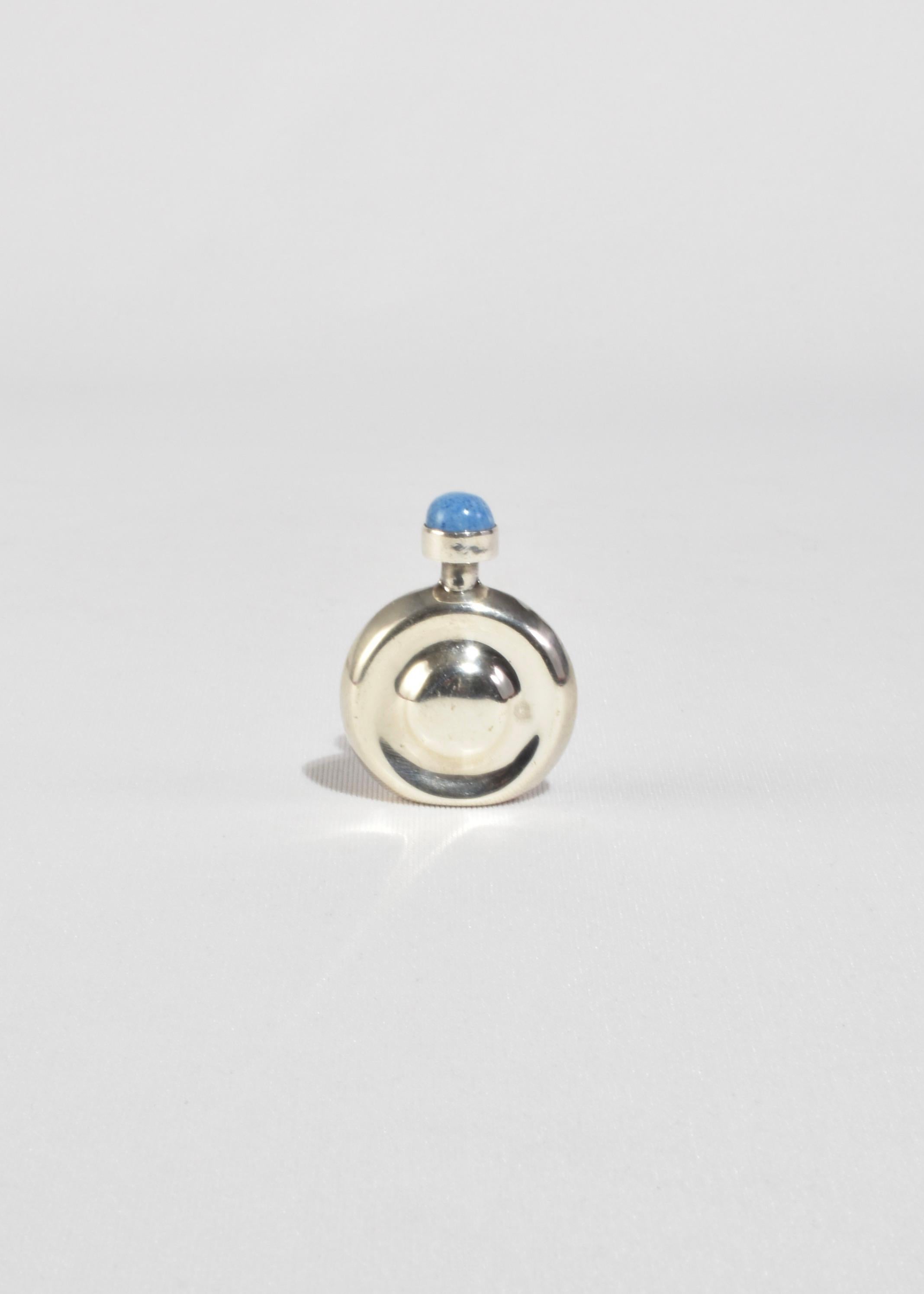 Bottiglia di profumo in argento sterling vintage a forma di cerchio con dettaglio turchese rotondo sulla parte superiore, timbro 925.