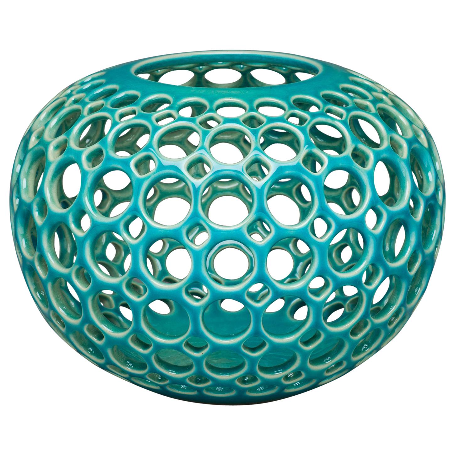 Turquoise Pierced Orb Shaped Tabletop Sculpture/ Candleholder