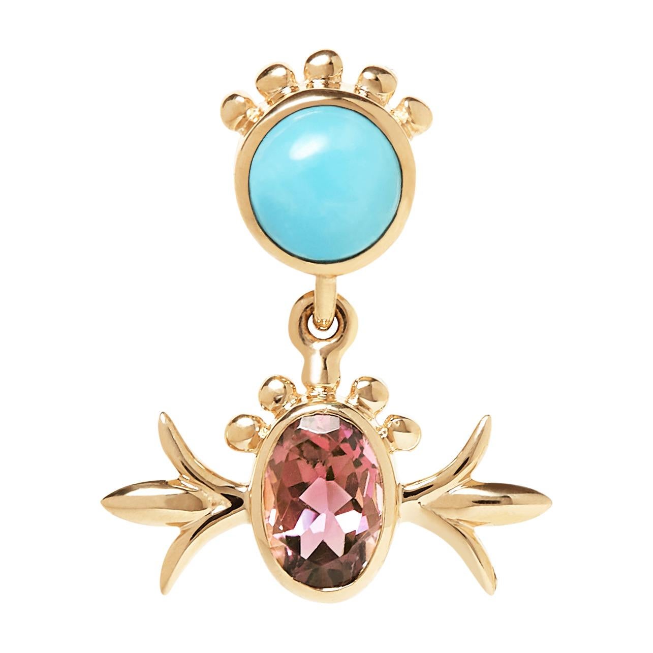 These Marlo Laz 14 Karat yellow gold turquoise and pink tourmaline squash blossom hanging studs are inspired by the southwest and an ode to Native American Navajo jewelry. 

From the Desert Rising collection, these earrings are available for special