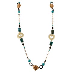 Collana lunga in turchese, cristallo di rocca, perle, calcedonio in oro e argento 9 carati