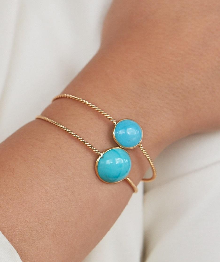 Tresor Turquoise Bangle features 8.40 cts stone in 18k yellow gold. The Bangle are an ode to the luxurious yet classic beauty with sparkly diamonds. Their contemporary and modern design makes them versatile in their use. The Bracelet are perfect to