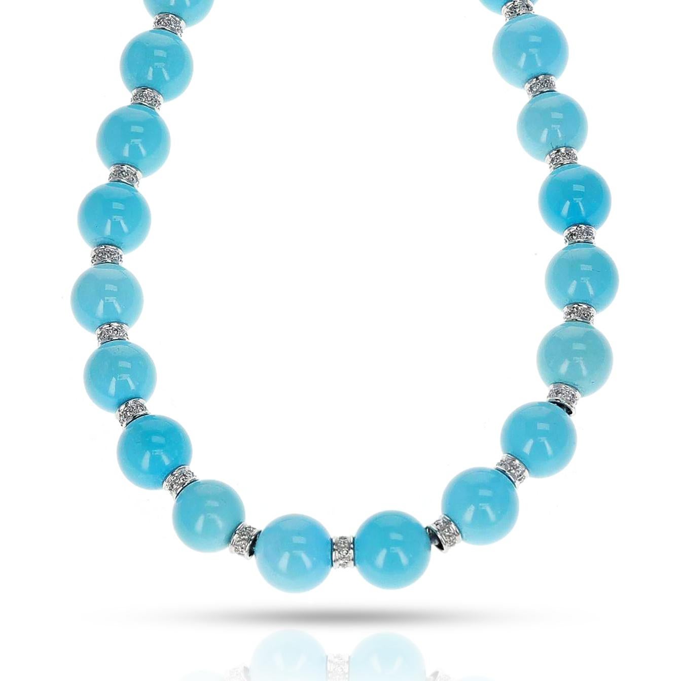 A necklace of 13.40-13.50 MM Turquoise Round Beads with Diamond Discs made in 18 Karat White Gold. The length is 17.75 inches. The total weight is 103.90 grams. 
