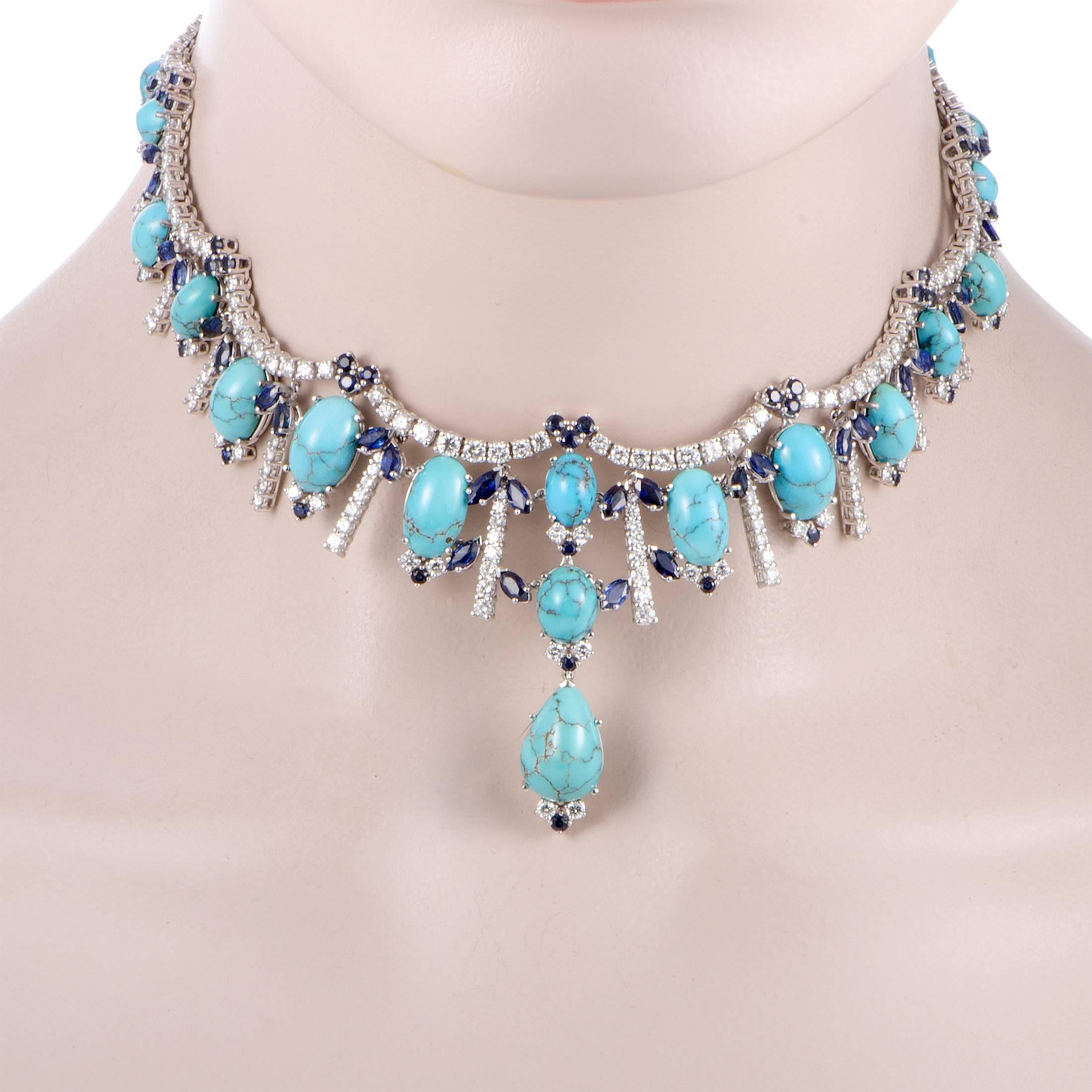 A true representative of what a statement piece looks like, this ravishing necklace is beautifully made of luxurious 18K white gold and extravagantly decorated with a plethora of sapphire, turquoise, and diamond stones. The diamonds amount to 9.86