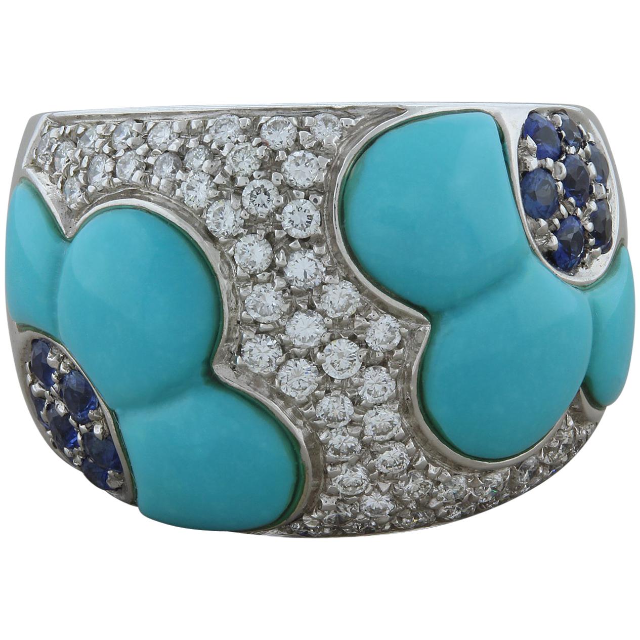 Anneau à fleurs en or avec turquoise, saphir et diamant