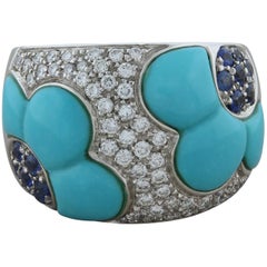 Anneau à fleurs en or avec turquoise, saphir et diamant