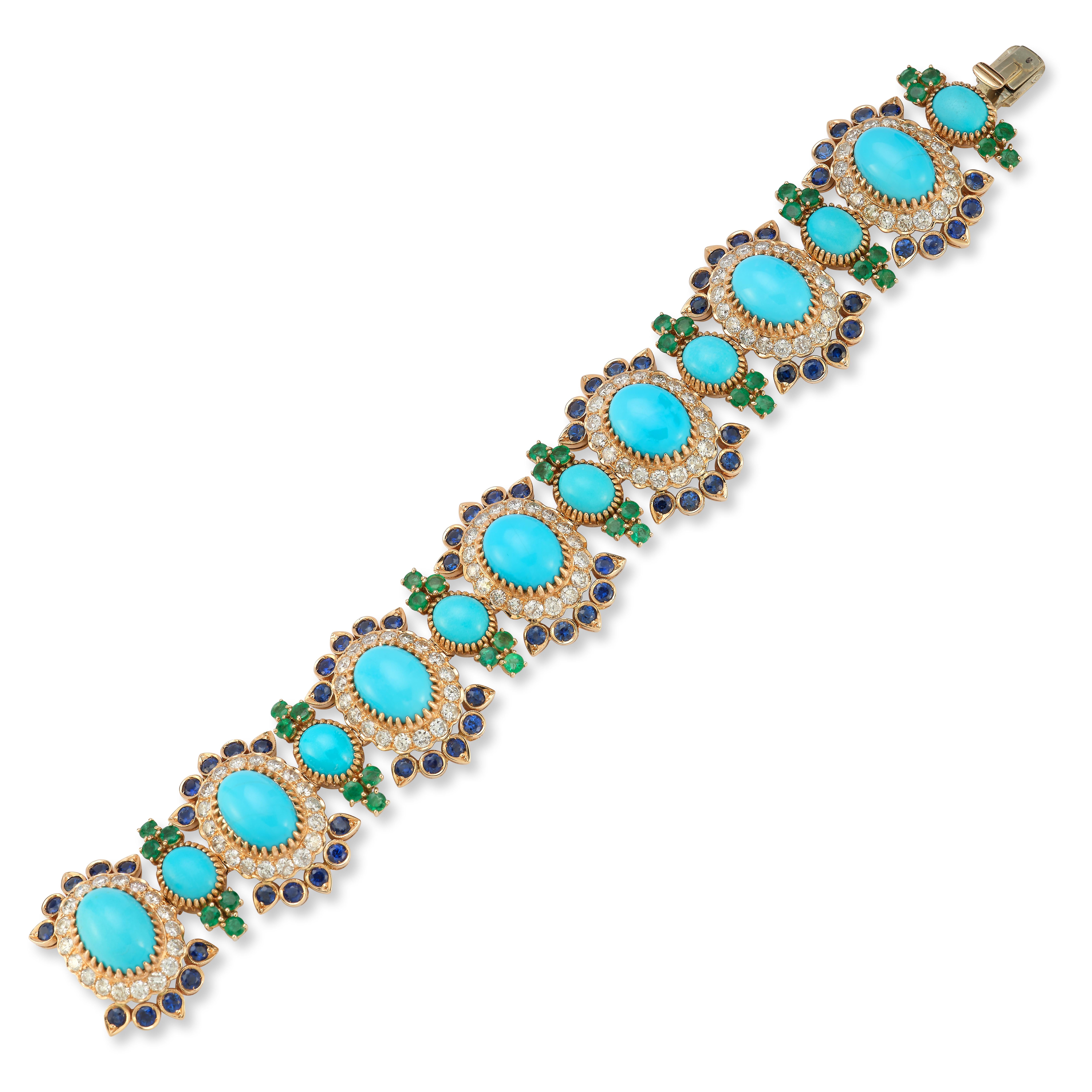 Turquoise Sapphire Emerald & Diamond Bracelet

A karat rose gold bracelet made of links set with a center cabochon turquoise framed by round cut diamonds and sapphires separated by smaller links set with a smaller cabochon turquoise and round cut