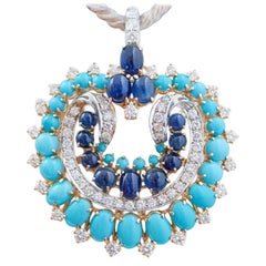 Turquoise, Sapphires, Diamonds, 18 Kt White Gold and Yellow Gold Brooch.