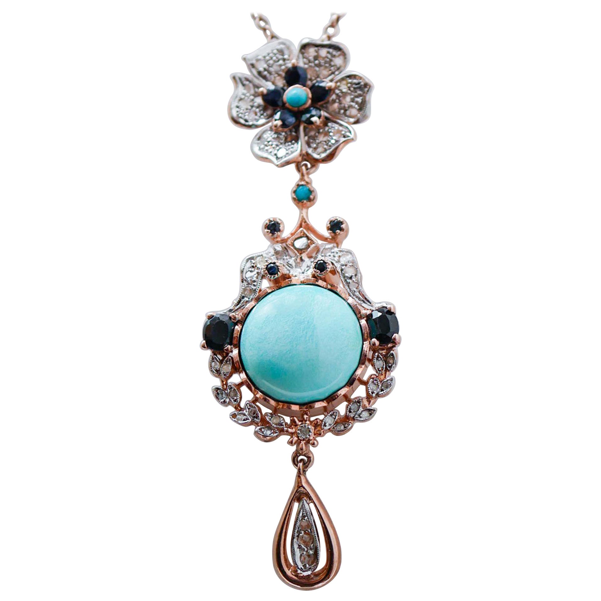 Collana con ciondolo in turchese, zaffiri, diamanti, oro rosa e argento.