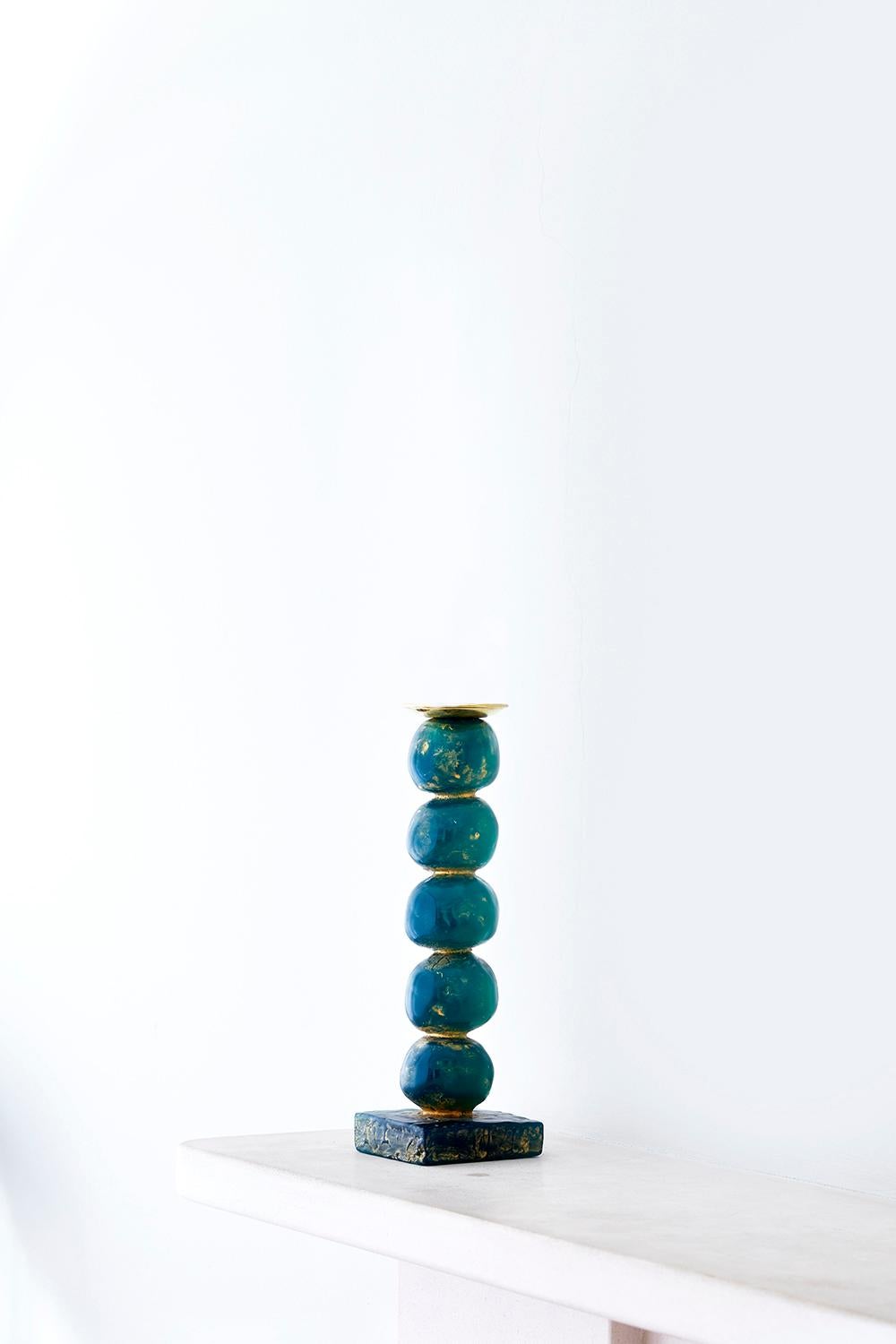 Margit Wittig has used her sculptural skills to create beautifully-crafted, well-proportioned candlesticks, which are compositions of her unique signature pearl-shaped designs.

Each candlestick begins as hand-sculpted spheres which are used to