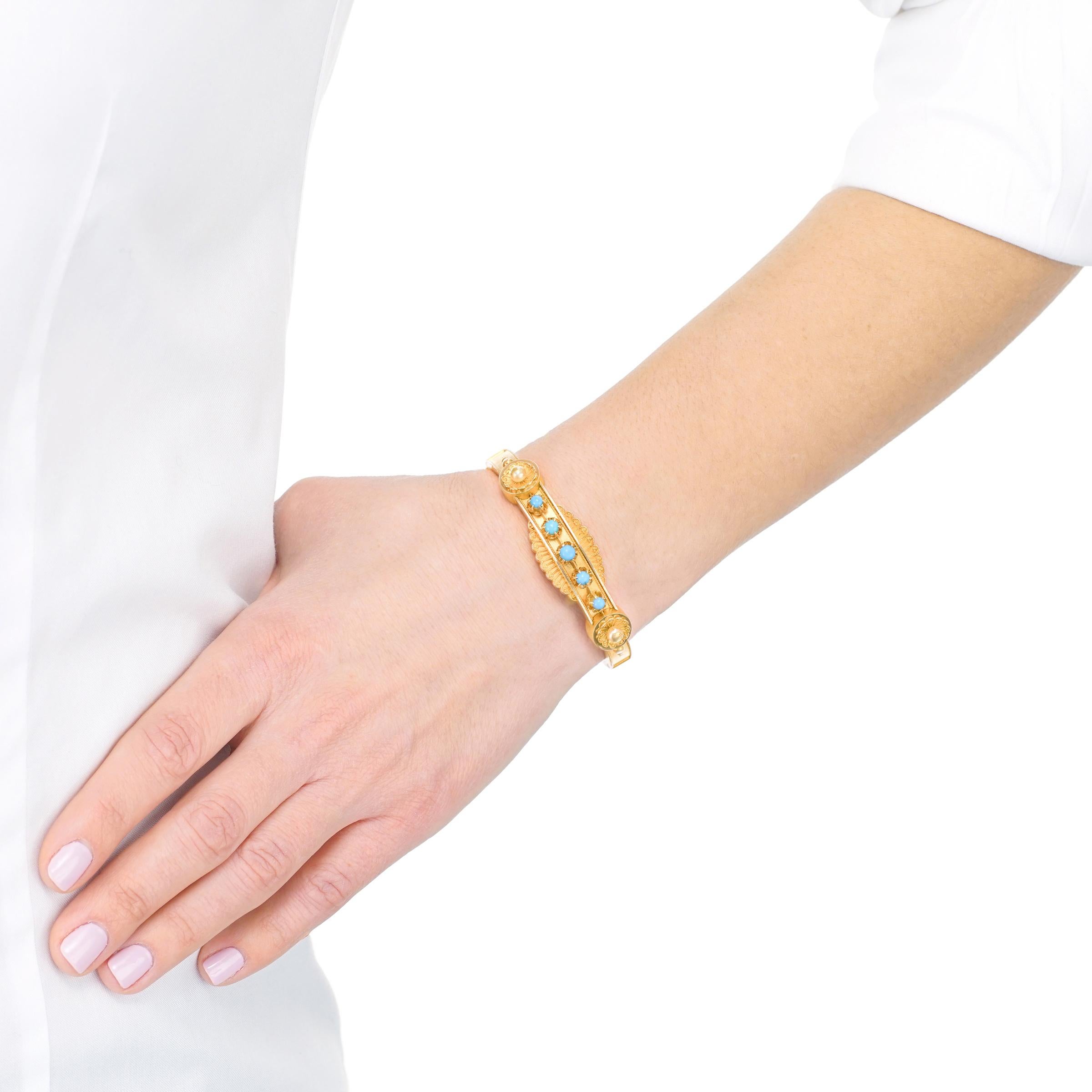 Circa 1880s, 14k, American.  This wearable bangle, borrowed from the Victorians, celebrates America's love affair with revival aesthetics. The look is wonderfully interpretive with a style centered on the Etruscan taste.  Perfect for any moment of