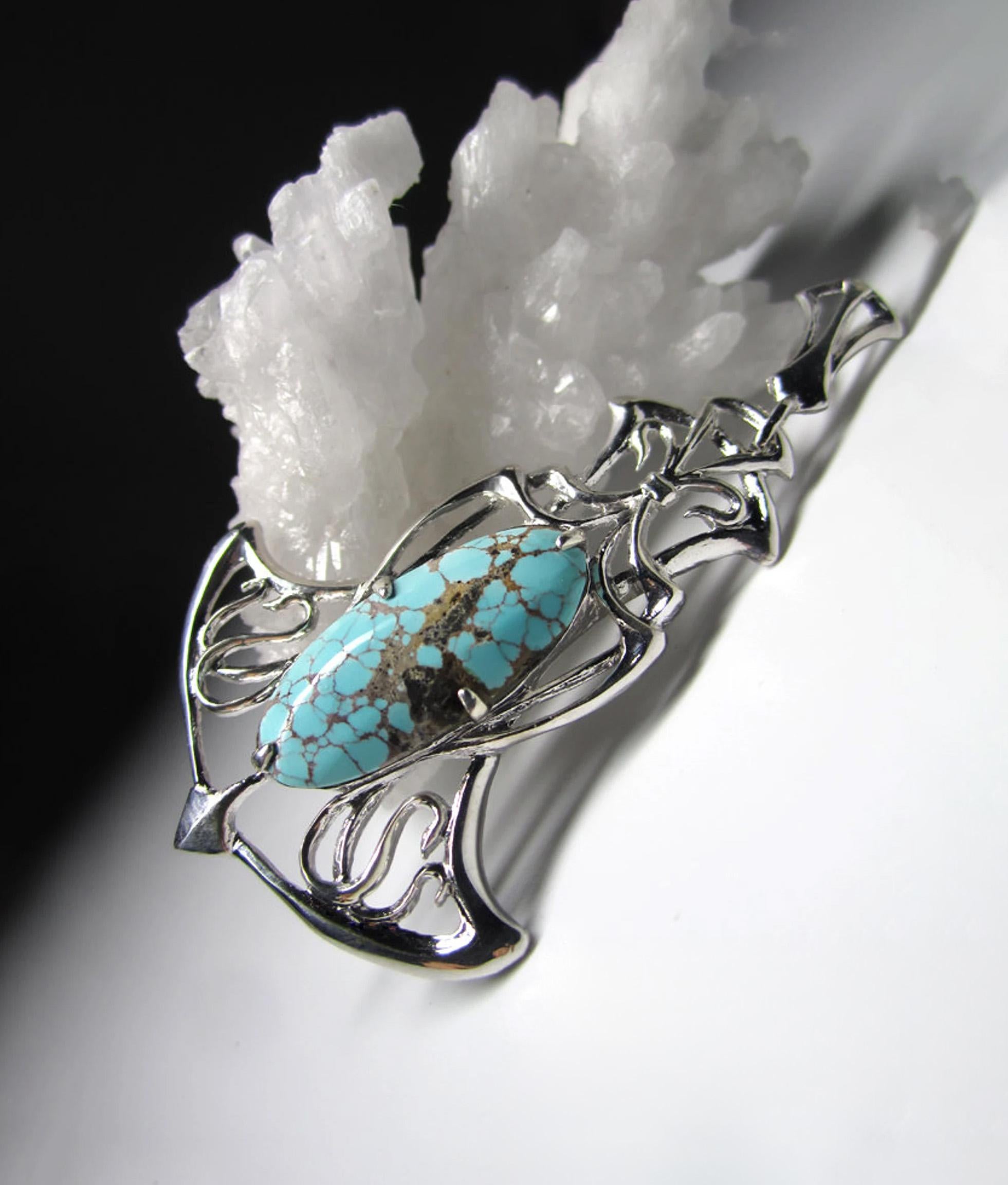 An Art Nouveau style silver pendant with natural Turquoise
turquoise origin - Nishapur
pendant weight - 5.42 grams
pendant height - 2.32 in / 59 mm
gemstone measurements - 0.2 x 0.35 x 0.87 in / 5 х 9 х 22 mm