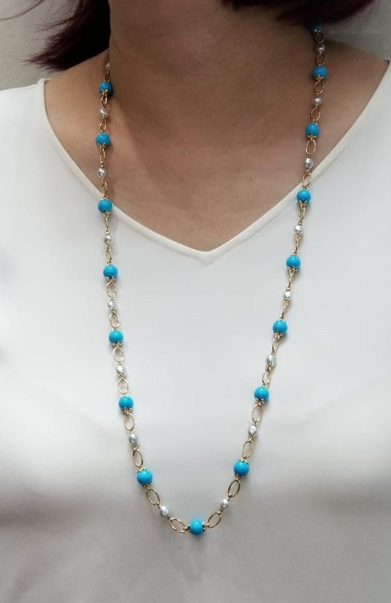 This necklace features 20 bead turquoises weight 72.95 carats, all the turquoises are from the prominent sleeping beauty mine. Sleeping Beauty Mine. Famous for it solid, light blue color with no matrix. Assented with 20 natural seed pearls. Necklace