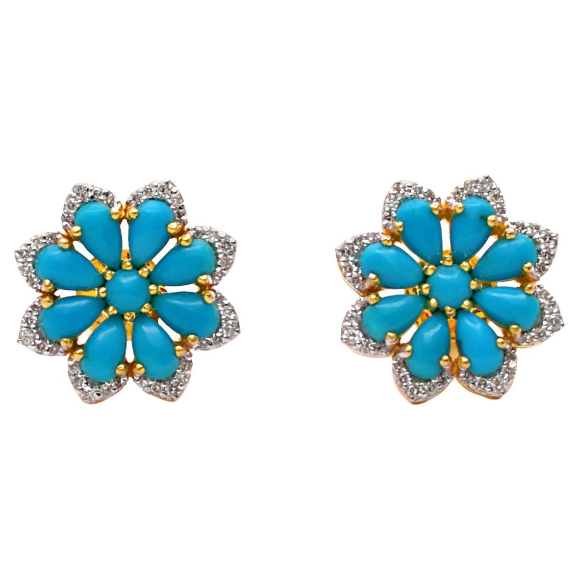 These earrings are made with turquoise gemstones and diamond pave. They are set in 14K gold. Shine all day long in this delicate pair of stud earrings. Perfect for gifting, they twinkle with timeless elegance. Easy to mix and match with other