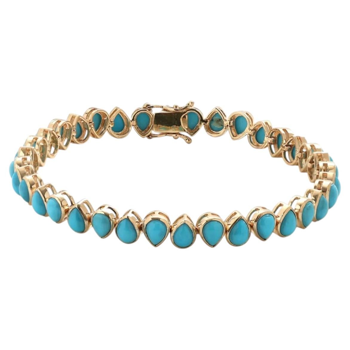 Bracelet tennis en or jaune avec une turquoise en forme de poire de 10,16 carats en vente