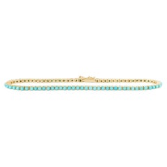 Bracelet tennis en or jaune 14 carats et turquoise