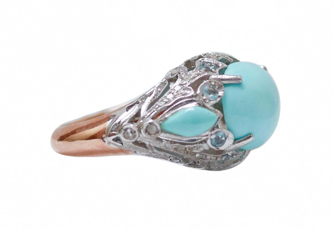 Fantastic ring in 14 kt rose gold and silver  structure mounted with a central turquoise  surrounded by diamonds, topaz and, laterally, two turquoise paste.
This ring was totally handmade by Italian master goldsmiths and it is in perfect