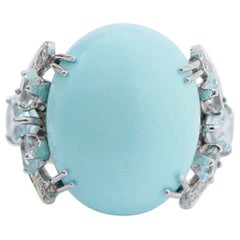 Anello con turchese, topazio, diamanti, platino e oro bianco 14 carati