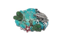 Broche grenouille en or 18 carats sertie de turquoises, tsavorites, rubis, diamants bruns et diamants