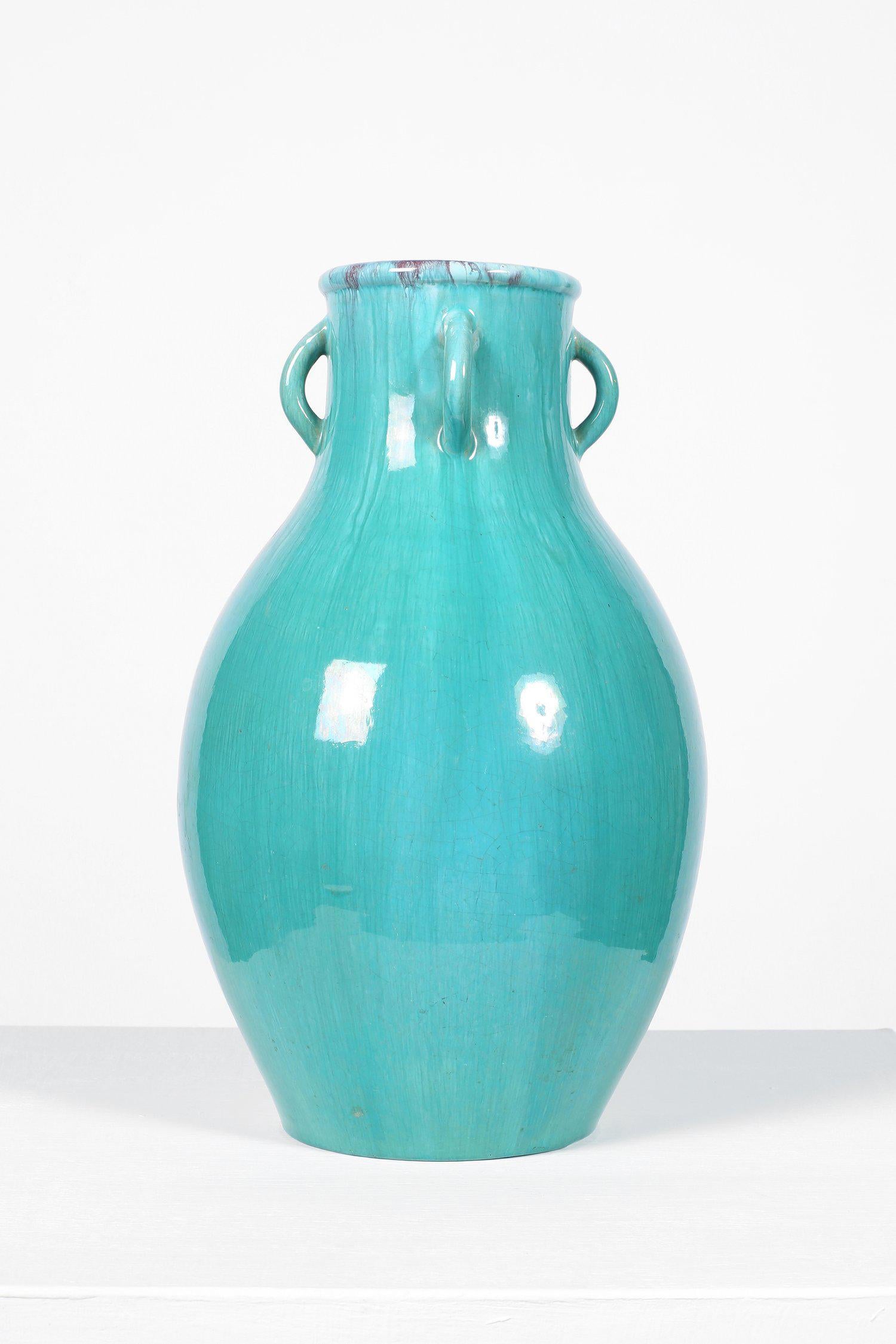 A turquoise glazed ceramic Art Deco vase by Atelier Primavera for Le Printemps Paris.
Made by CAB (Ceramiques d'Art de Bordeaux) 
Stamped.
French, circa 1930.