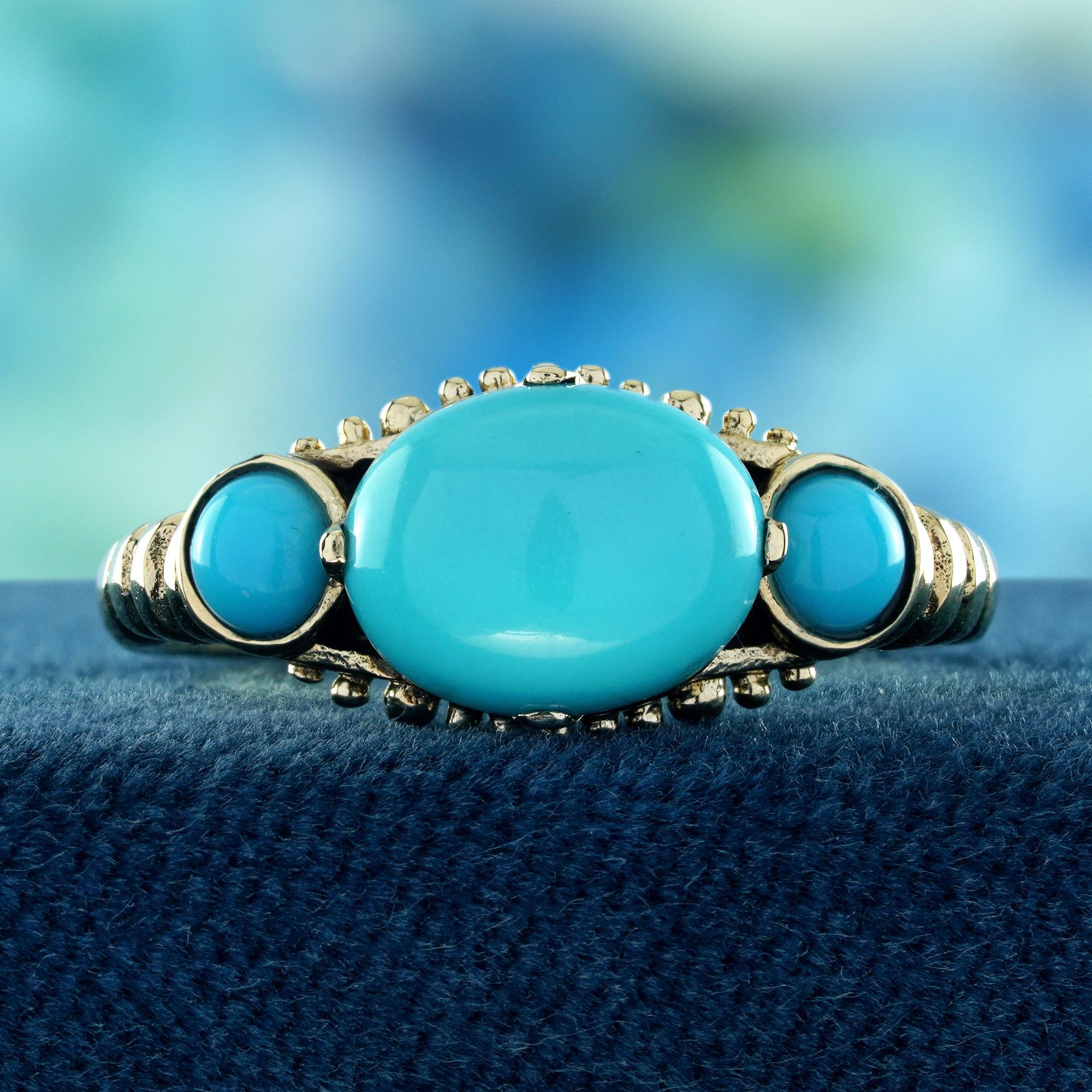 Natural Turquoise Vintage Style Three-Stone Ring in 9K Yellow Gold like soft blue clouds cradled by golden sunlight, this ring embodies serenity and charm. 
The trio of natural turquoise gemstones radiates tranquil hues, evoking a sense of calm and