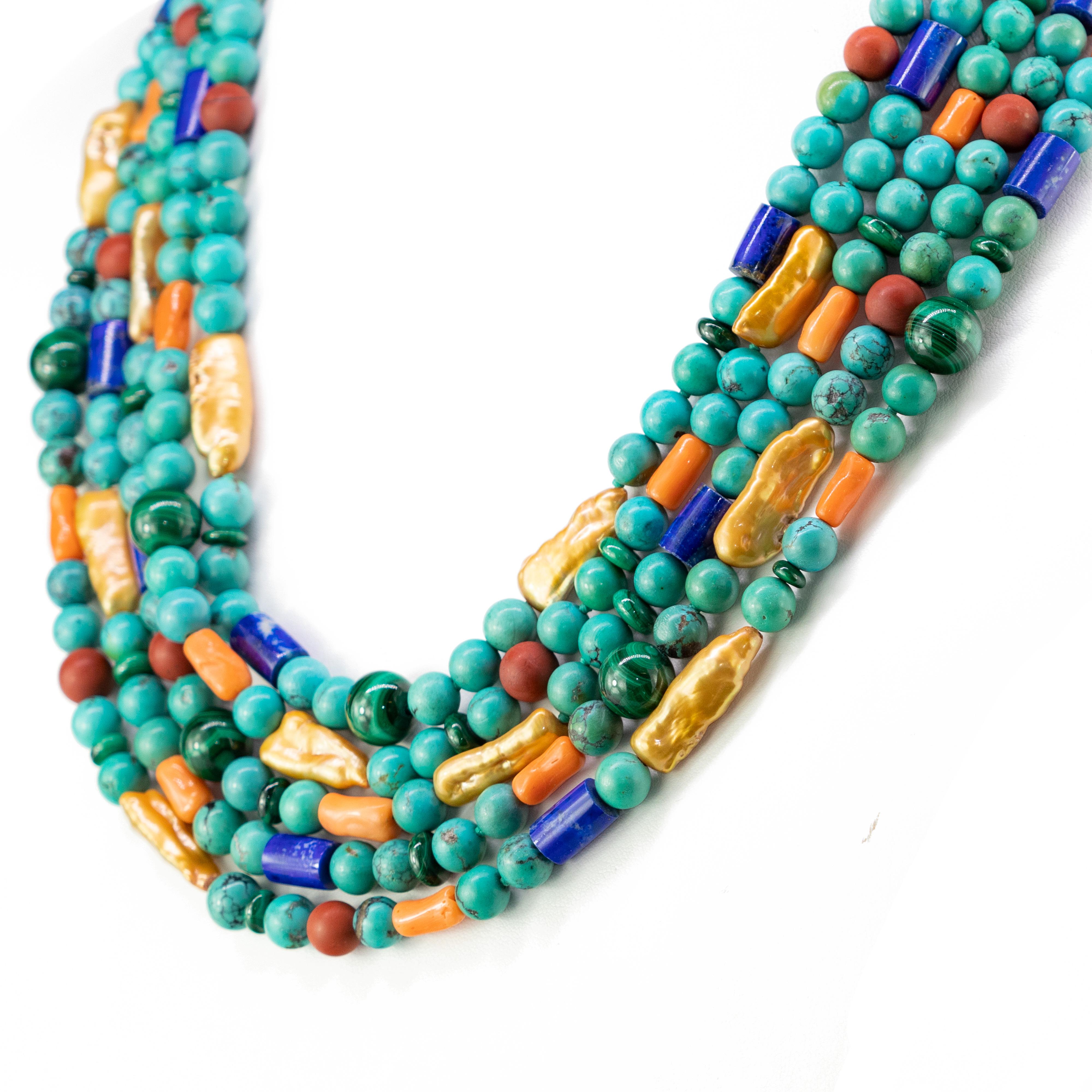 Inspired by the treasures of ancient Europe, this summer vibe necklace is made with natural turquoises , lapis lazuli, pearls, pink coral, malachite and satin carnelian.

Is inspired by the magnificent Swiss landscapes during the summer. The green