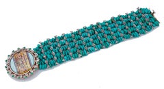 Bracelet en or rose 14 carats, tsavorite, diamants et pierres