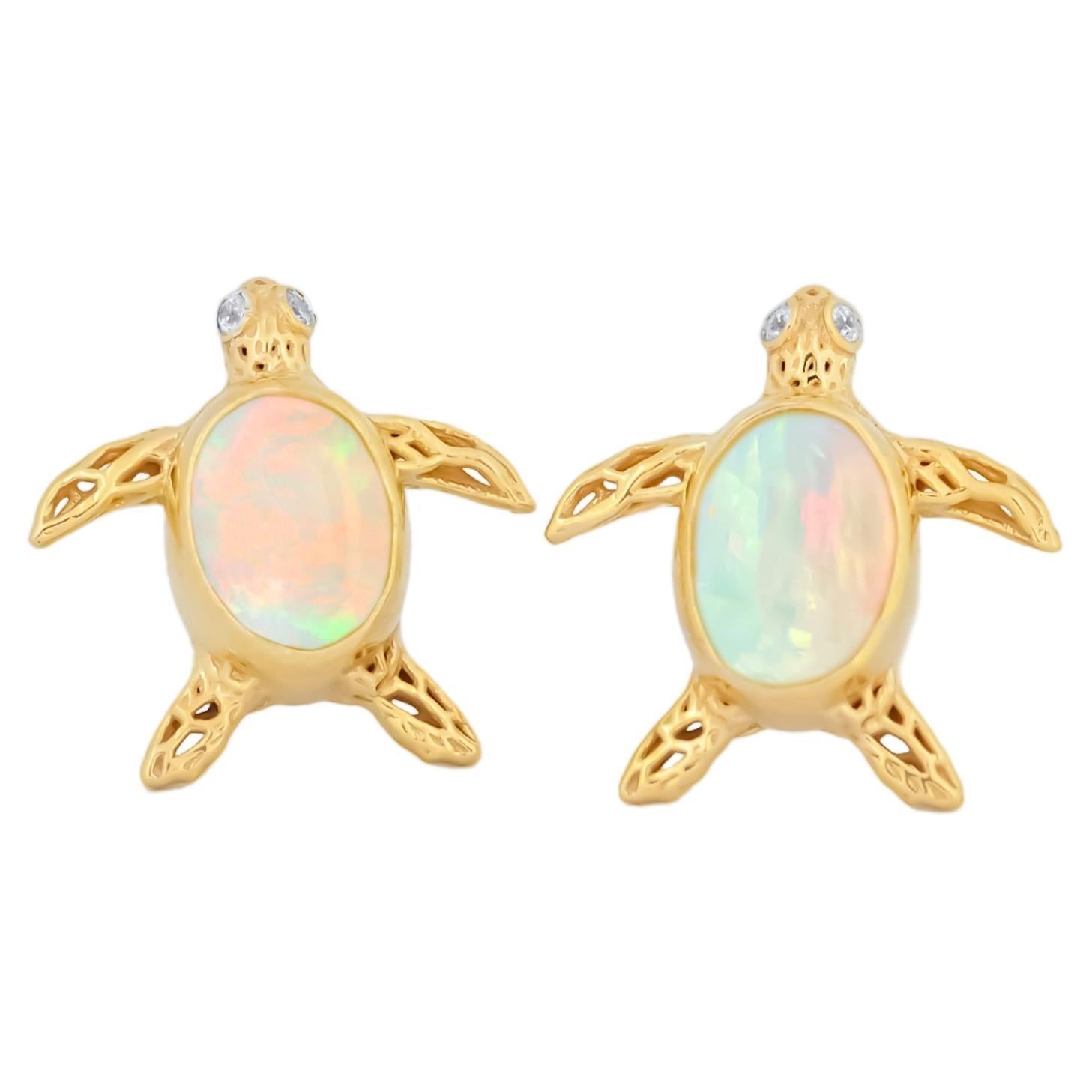 Turtle earrings studs with opals in 14k gold.
